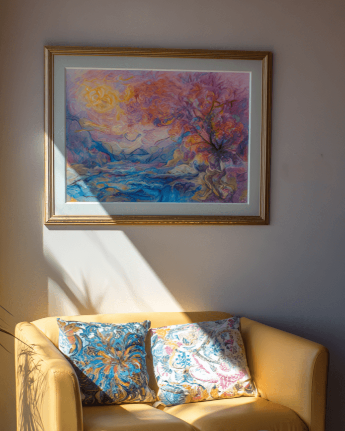 Vibrant, fantastical landscape painting with mountains, water, and sun above a yellow sofa.